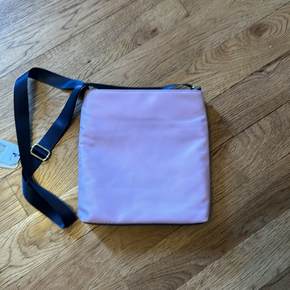 NWT.  Cute Purple purse. Adjustable strap - Picture 2 of 5